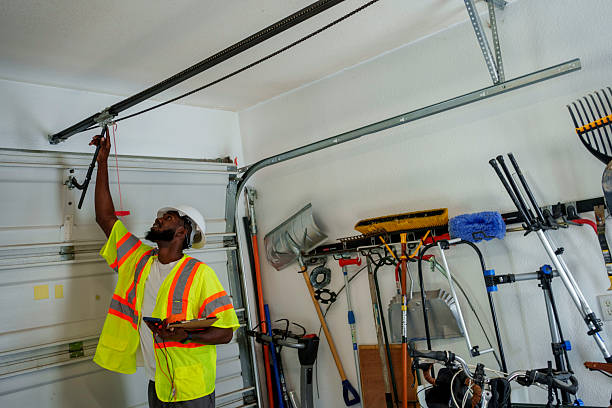 Professional Garage Door Maintenance technician working in Claycomo, MO